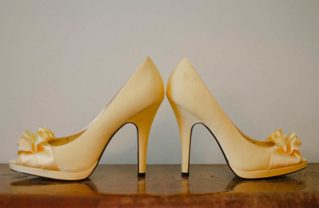 A symmetrical picture of a pair of shoes. photography tip